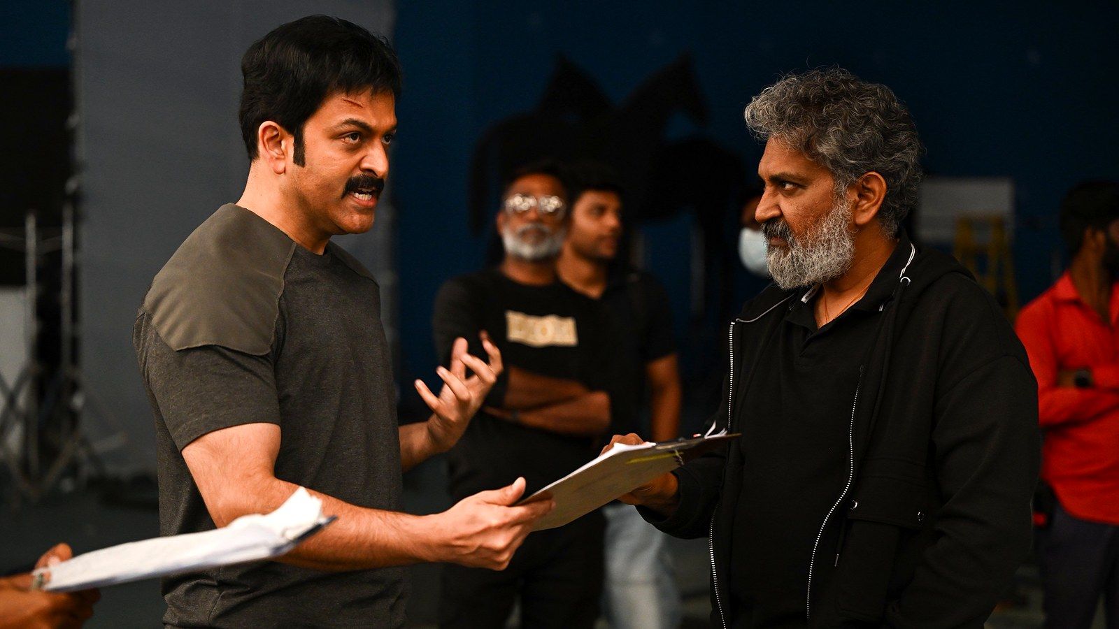 Prithviraj Sukumaran and SS Rajamouli going over the script on the Varanasi set
