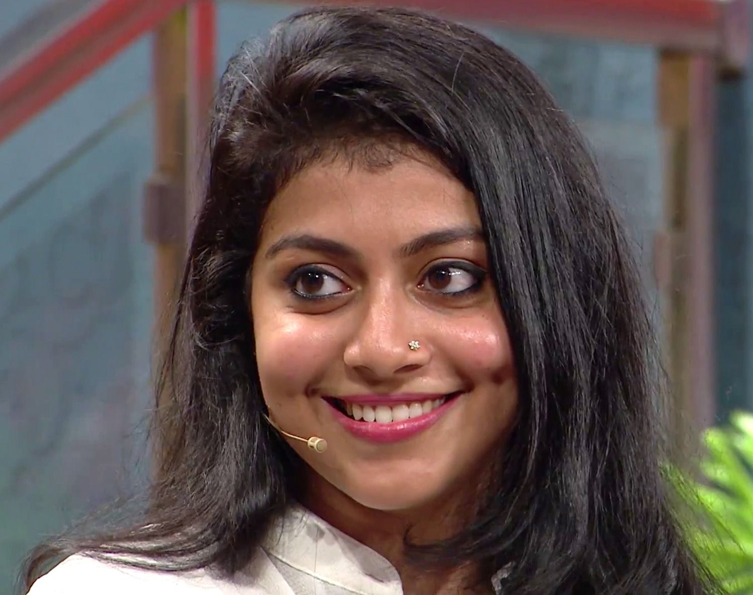 Shruti Ramachandran smiling with a nose stud, close-up portrait