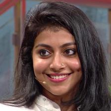 Shruti Ramachandran smiling with a nose stud, close-up portrait