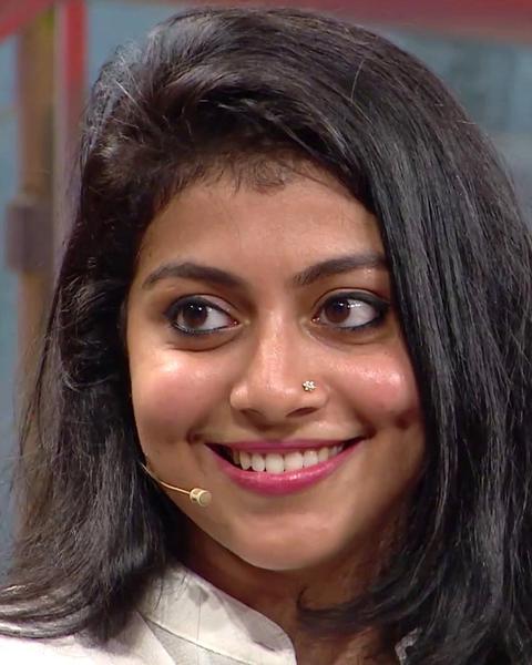 Shruti Ramachandran smiling with a nose stud, close-up portrait