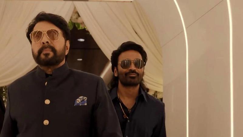 Mammootty and Dhanush in black outfits in a still from the OM teaser