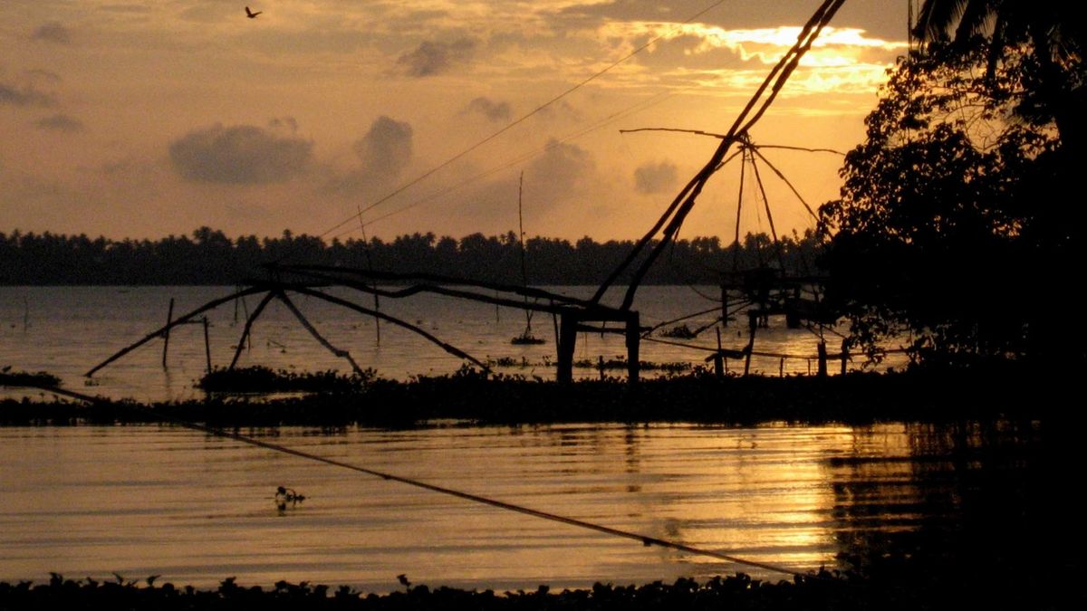 Chinese fishing net at sunset in Kochi, on the coast where kavaru is sometimes seen