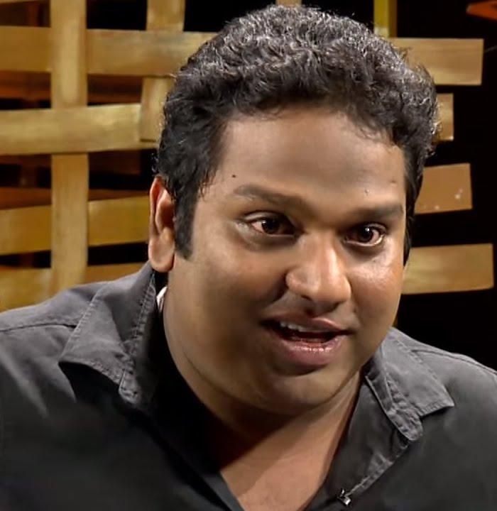 Vipin Atley smiling in a black shirt, close-up portrait
