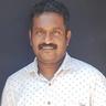 Kiran Peethambaran in a white printed shirt outdoors, portrait