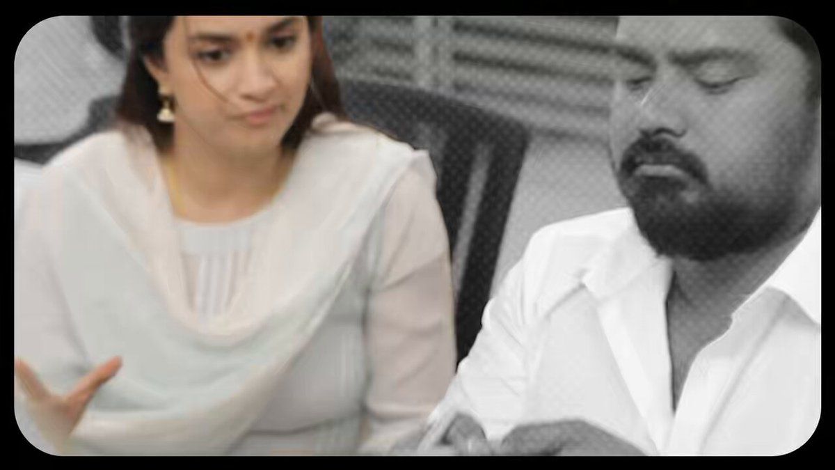 Keerthy Suresh in a white churidar gesturing as she talks to a bearded man in a white shirt at a table, black-and-white teaser still from Sathyavan Savithiri