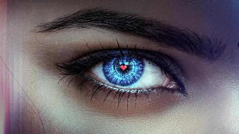 Zera first-look poster: close-up of a woman's eye with a glowing blue iris and a small pink heart