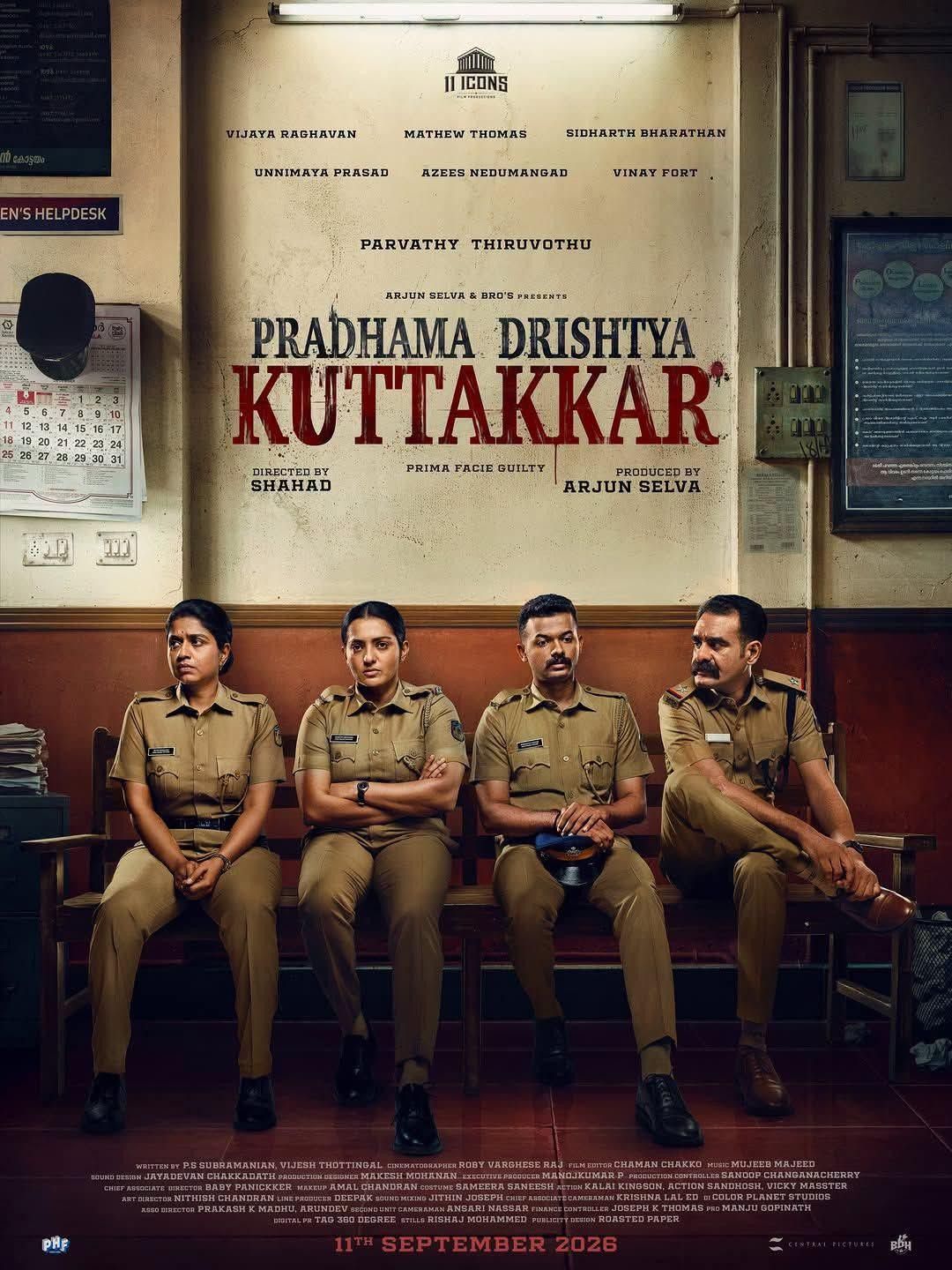 Pradhama Drishtiya Kuttakkar poster with Parvathy Thiruvothu and police officers on a station bench