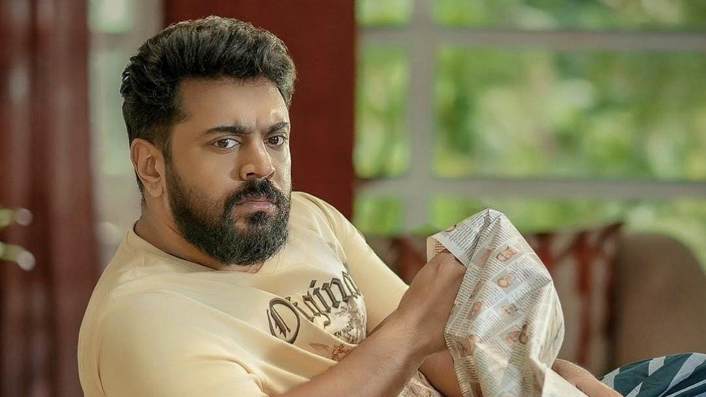 NP 51 first look with Nivin Pauly seated in a T-shirt holding a cloth