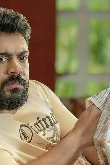 NP 51 first look with Nivin Pauly seated in a T-shirt holding a cloth