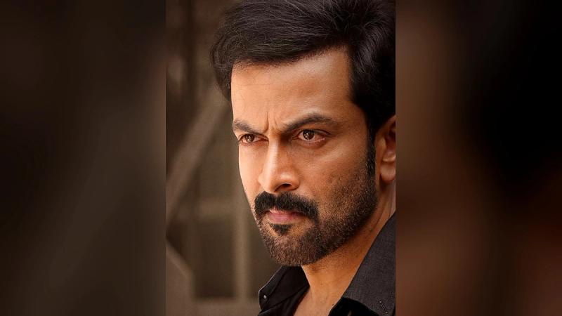 Prithviraj Sukumaran with an intense stare in a black shirt in a Khalifa poster