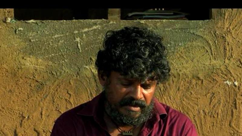 Devadas as Manikyan in a still from Malayalam film Malavazhi