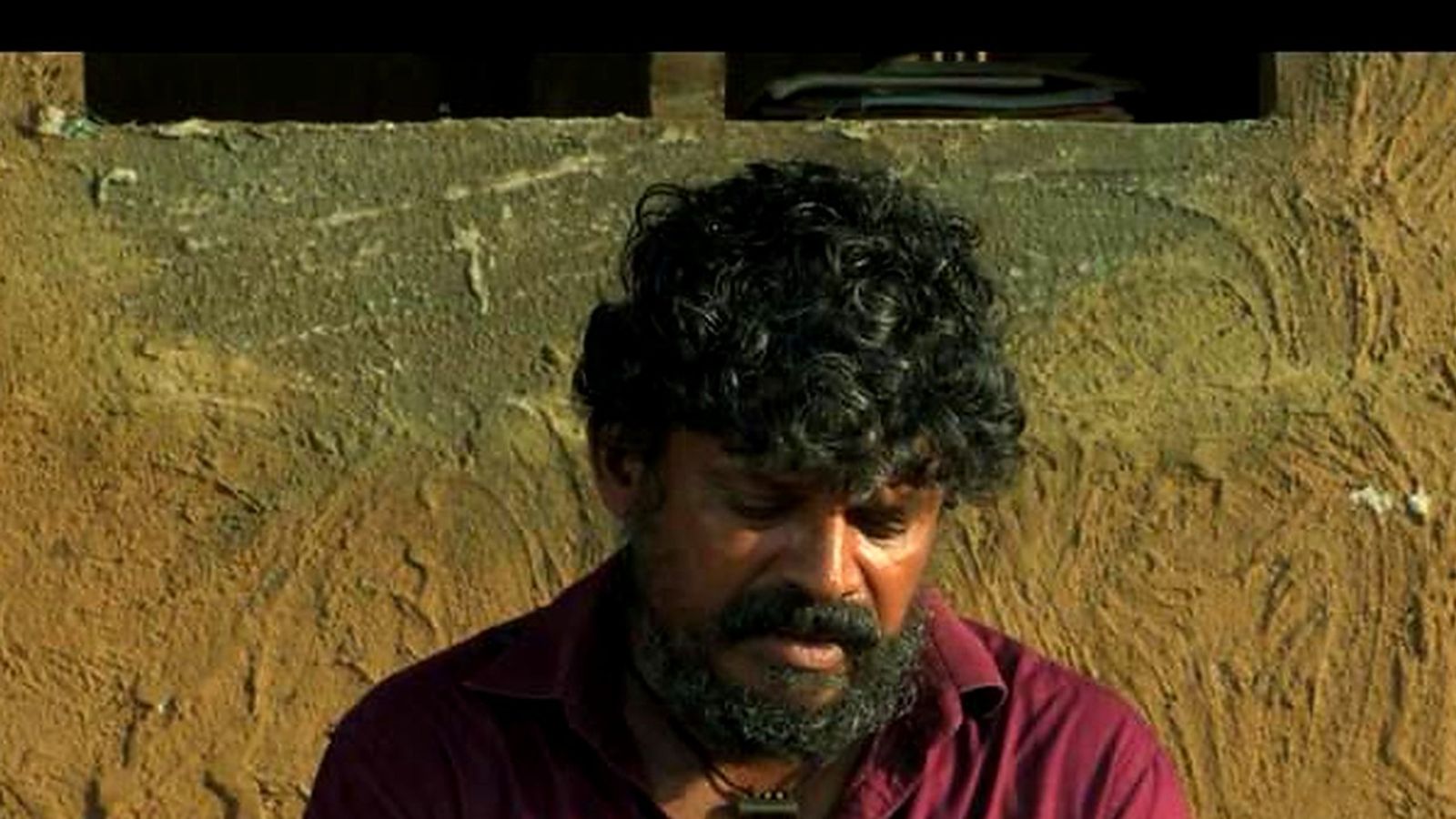 Devadas as Manikyan in a still from Malayalam film Malavazhi