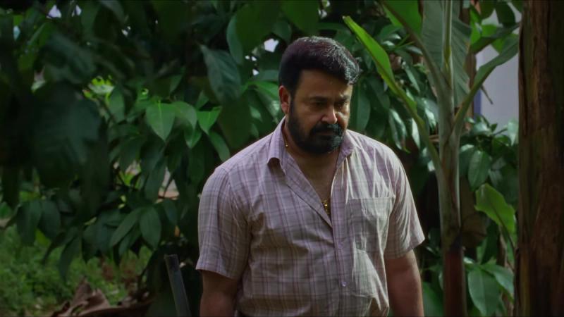 Mohanlal as Georgekutty in a checked shirt among banana plants in the Drishyam 3 trailer