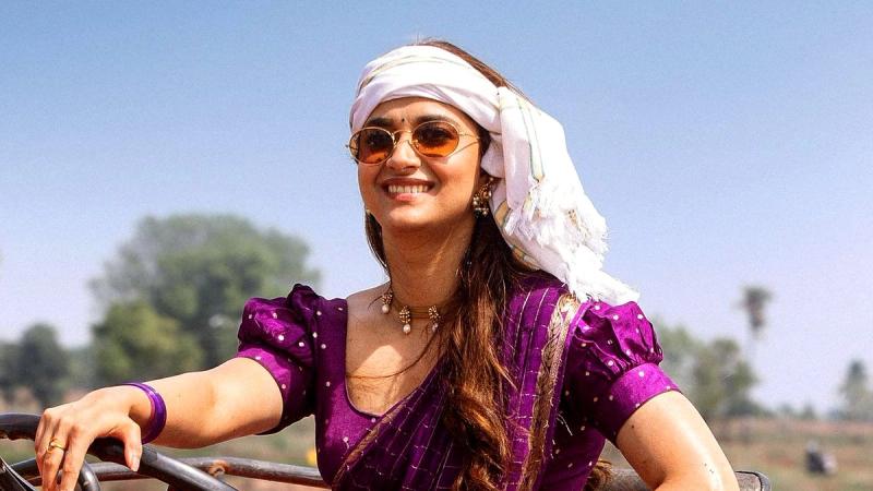 Keerthy Suresh smiles on a tractor as Latha Reddy in January 12 Vidudala