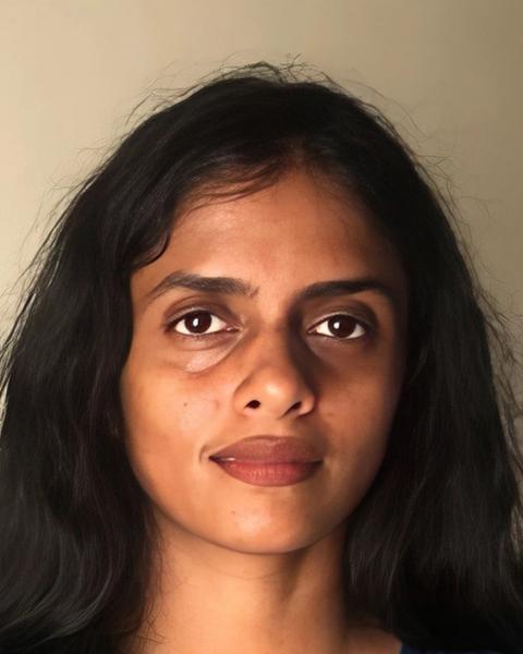 Kani Kusruti with long dark hair, close-up portrait