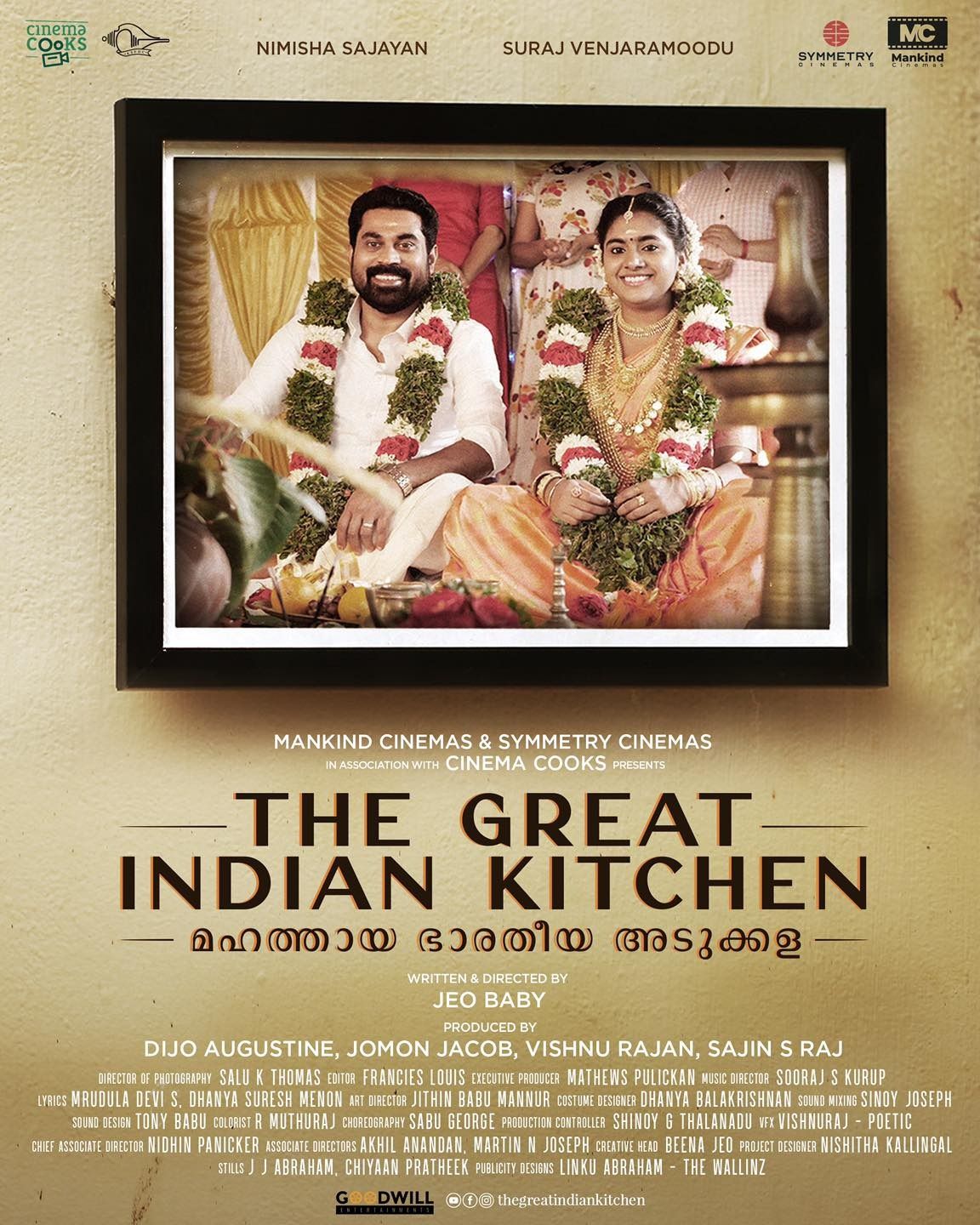 The Great Indian Kitchen poster with a framed wedding photo of the couple hung on a kitchen wall