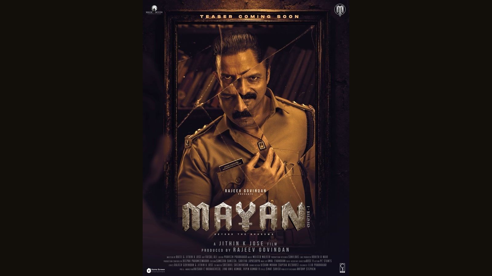 Jayasurya in police uniform behind cracked glass on the Mayan: Chapter 1 teaser announcement poster