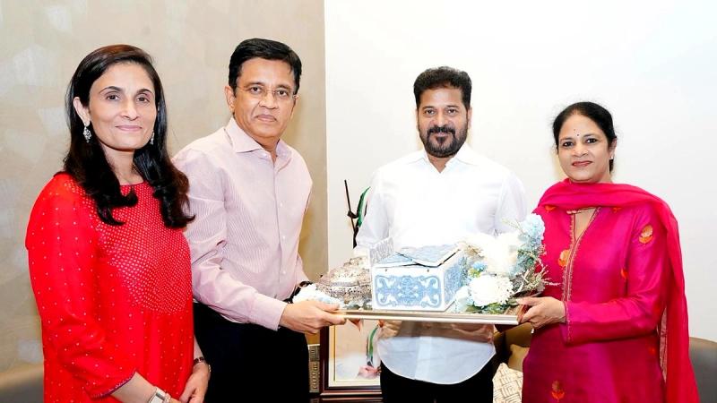 Kalanithi Maran and Kavery Maran present a wedding reception invitation to Telangana Chief Minister A Revanth Reddy