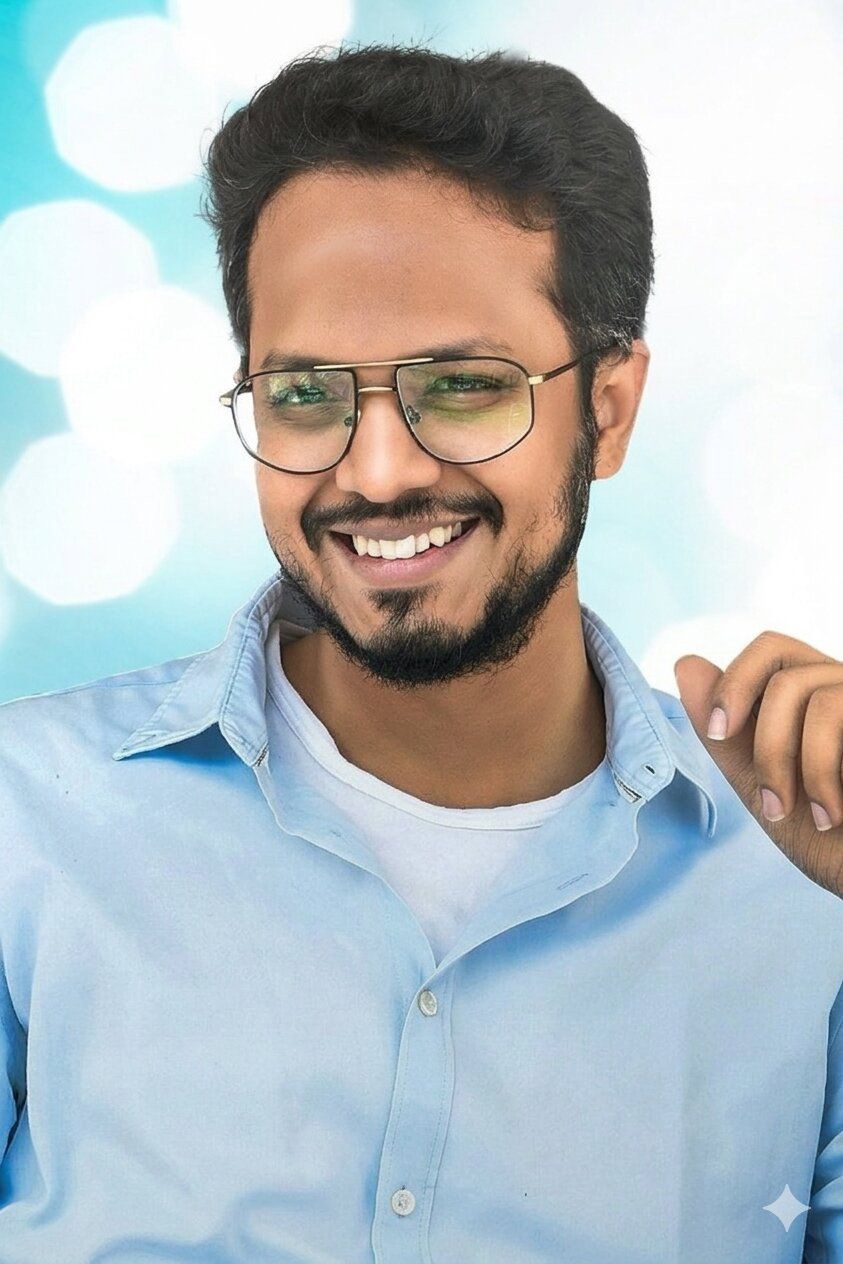 Rahul Sankrityan wearing glasses, front-facing portrait