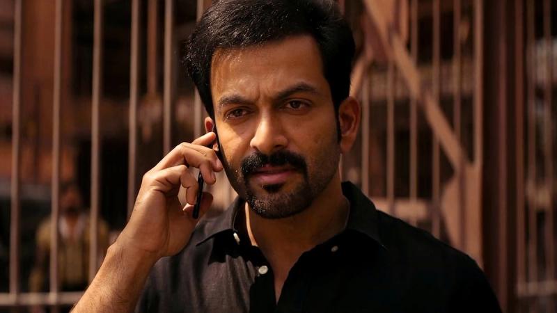 Prithviraj Sukumaran on a phone call in a still from the Khalifa trailer