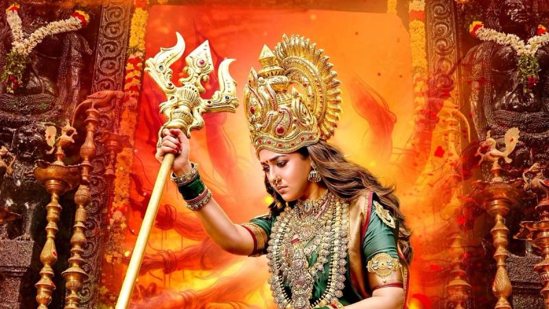 Nayanthara as the goddess with a trident in the Mookuthi Amman 2 poster