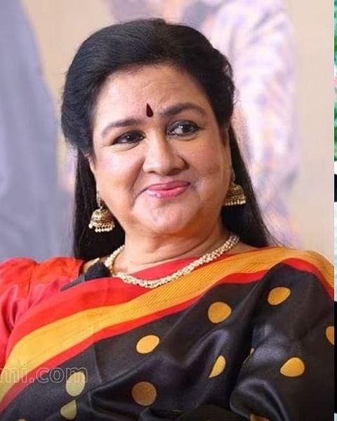 Urvashi smiling in a red and yellow saree, portrait