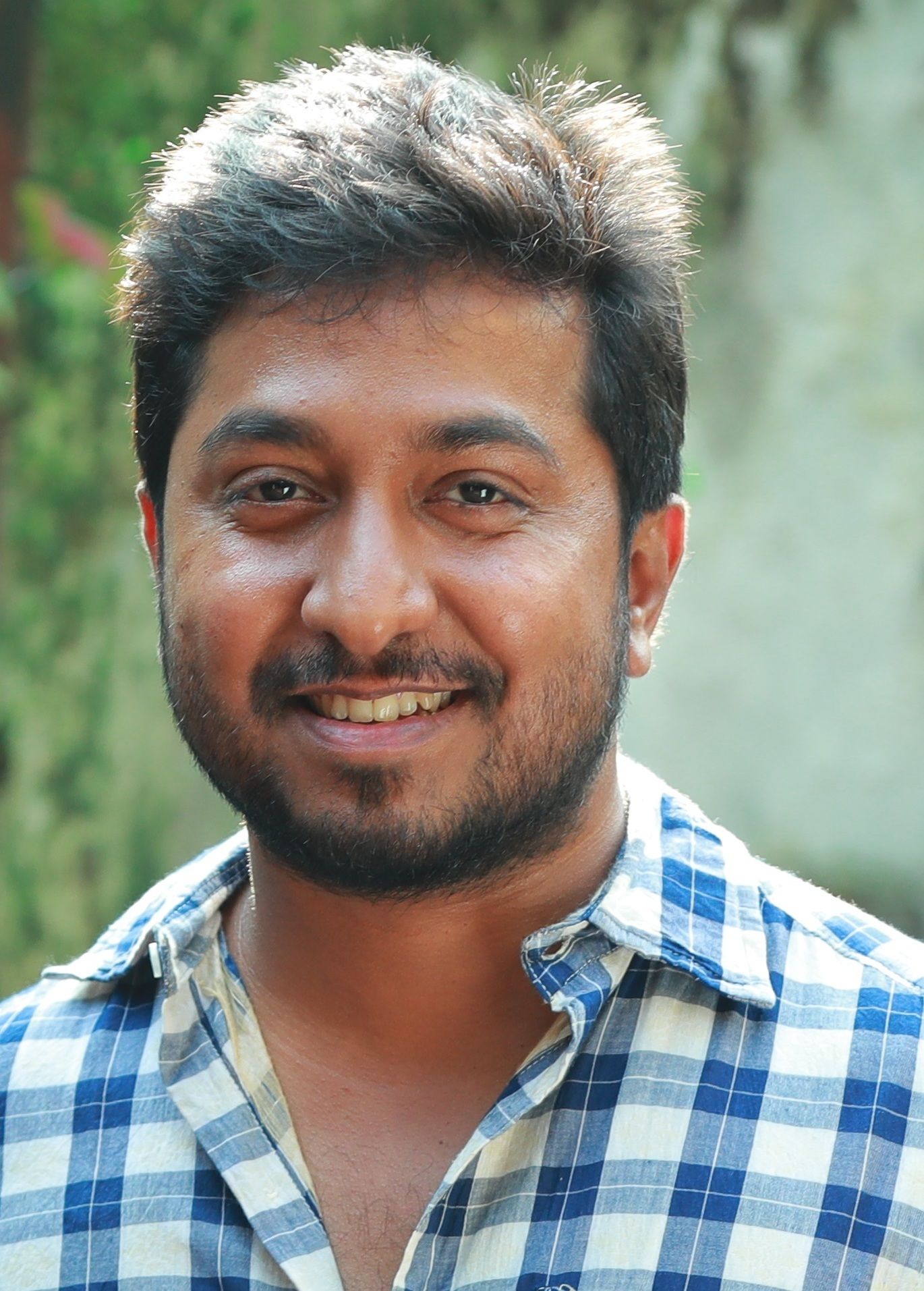 Vineeth Sreenivasan in a still from Aravindante Athidhikal