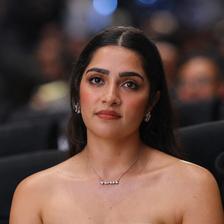 Rukmini Vasanth in a strapless outfit at an event