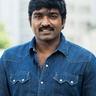 Vijay Sethupathi in a denim shirt outdoors, half-length portrait