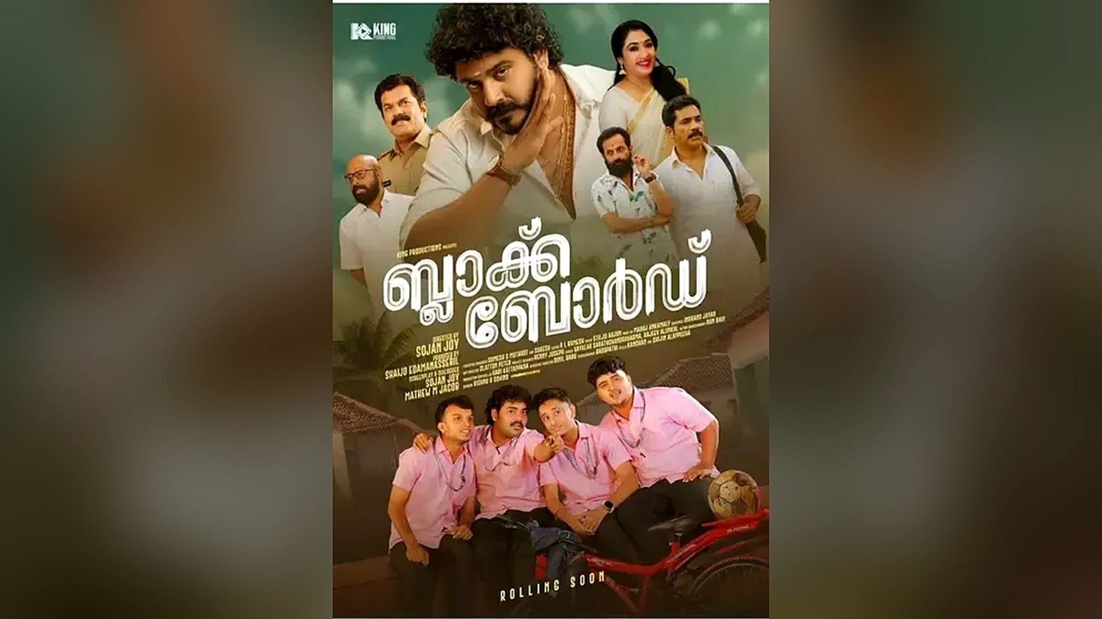 Official poster of the Malayalam film Black Board, showing the lead cast above four young men in pink uniforms with a bicycle