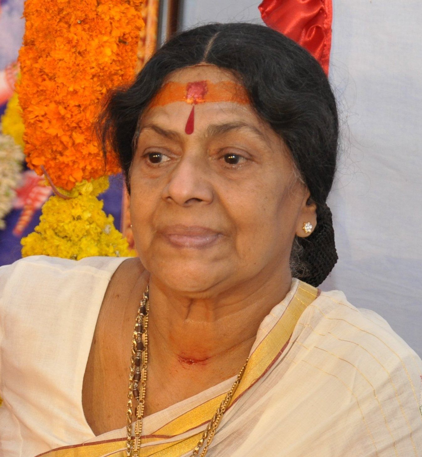 Sukumari with a sandal mark on her forehead, smiling portrait