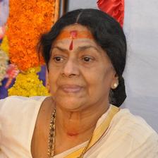 Sukumari with a sandal mark on her forehead, smiling portrait