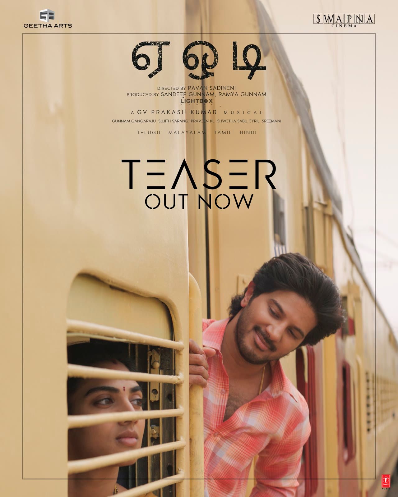 Dulquer Salmaan leaning out of a train window on the Aakasamlo Oka Tara poster