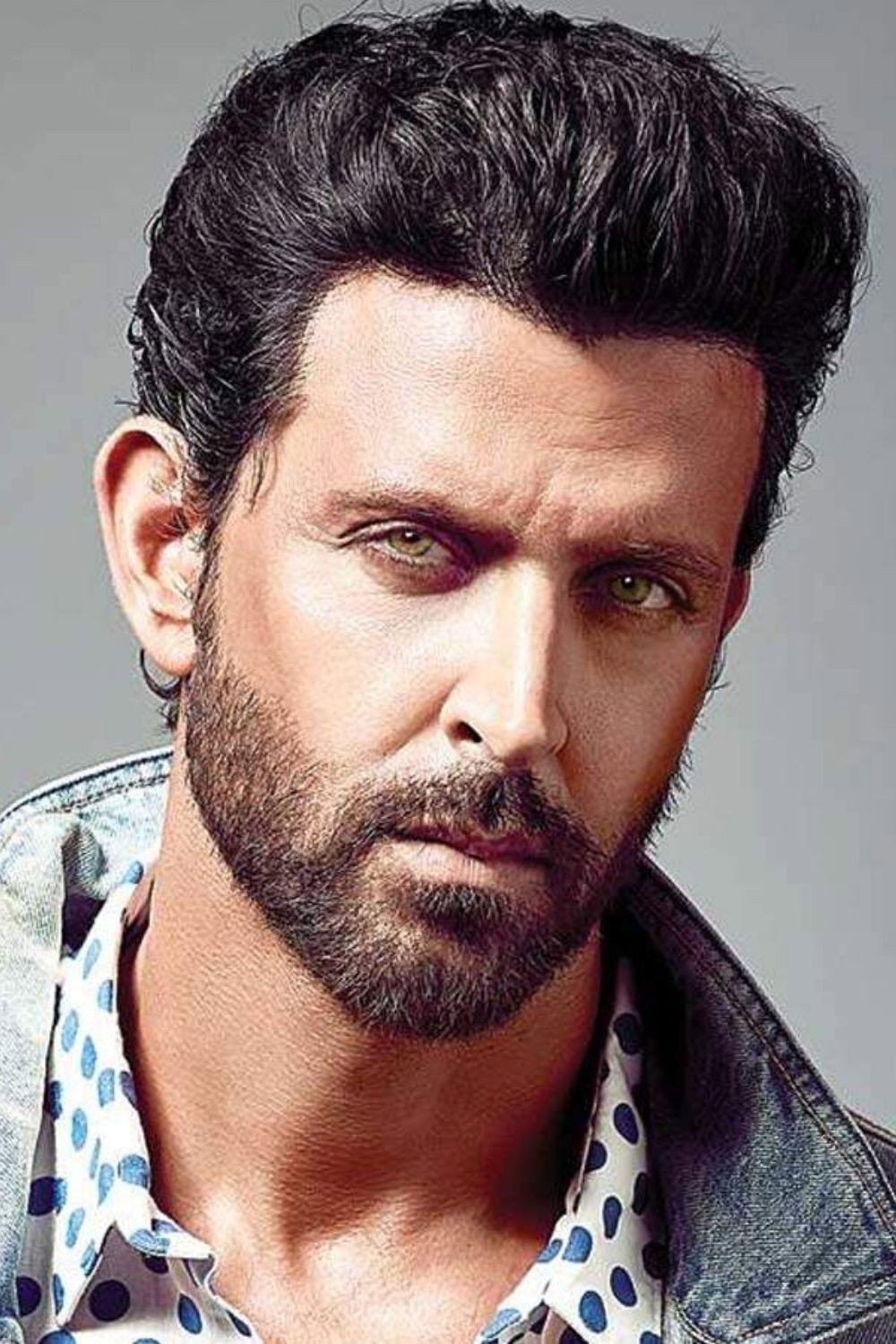 Hrithik Roshan with a beard in a denim jacket, portrait