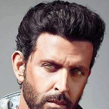 Hrithik Roshan with a beard in a denim jacket, portrait