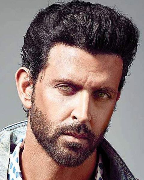 Hrithik Roshan with a beard in a denim jacket, portrait