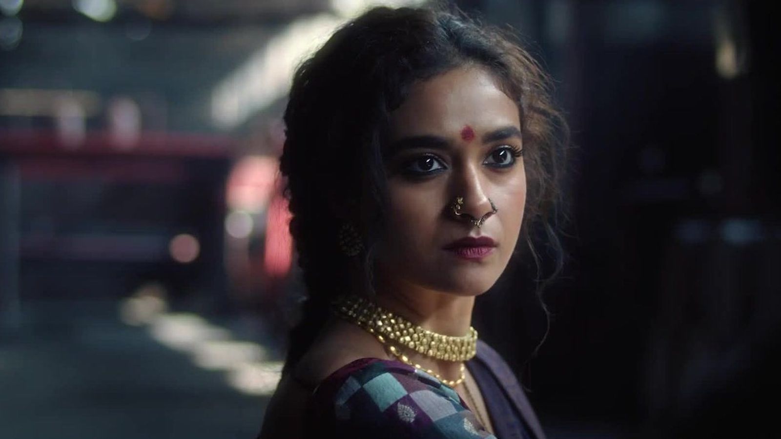 Keerthy Suresh in a close-up from the official trailer of the Netflix series Akka