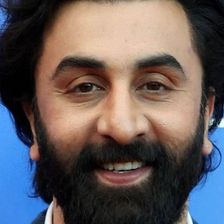 Ranbir Kapoor smiling with a full beard