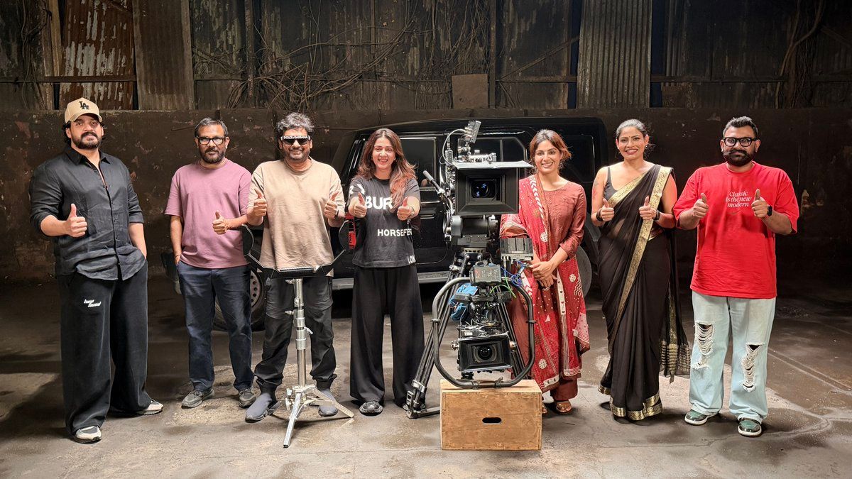 SlumDog – 33 Temple Road cast and crew giving a thumbs-up beside a cinema camera at the end of the shoot