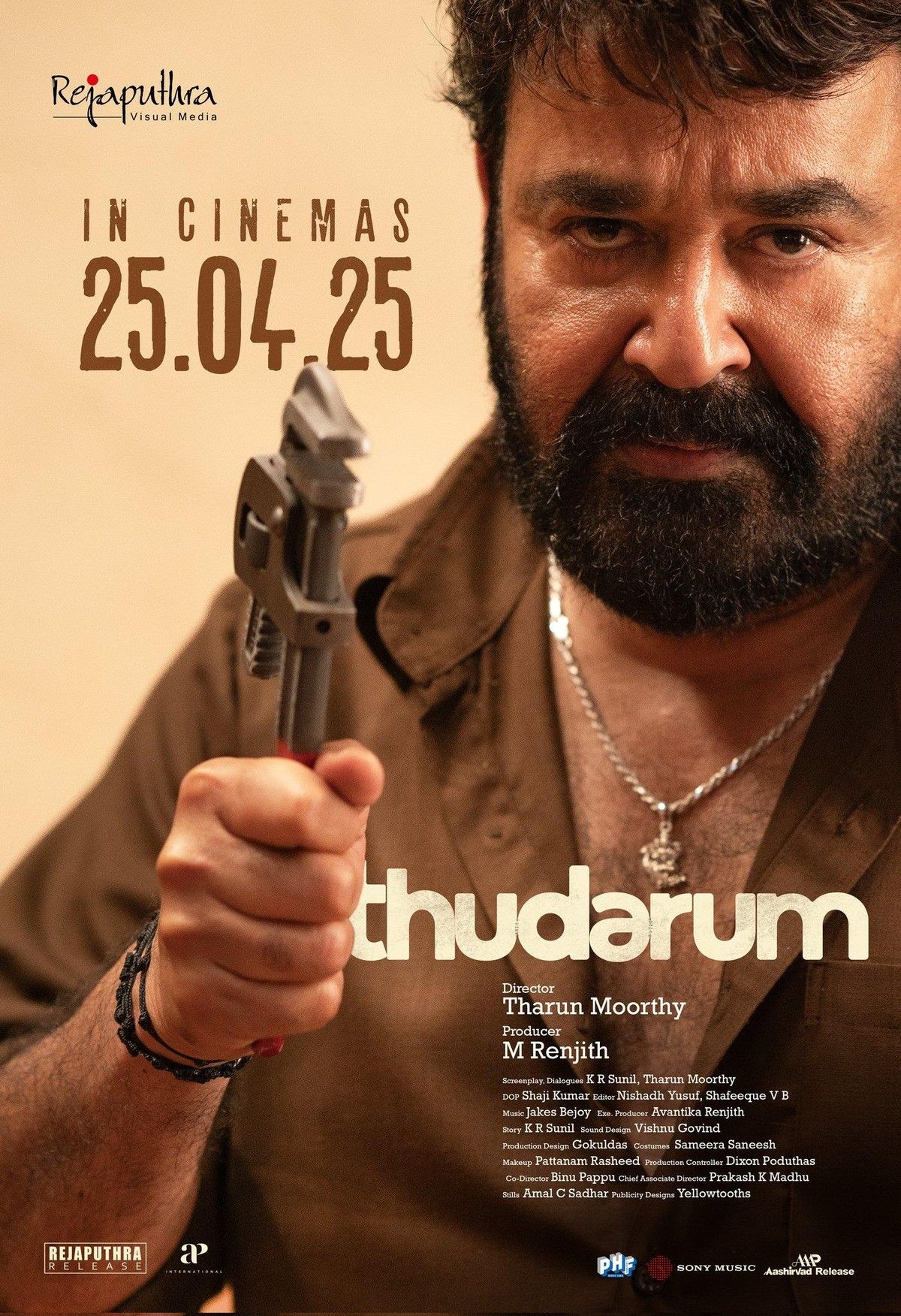 Thudarum poster with Mohanlal holding a wrench, 25 April 2025 cinema release
