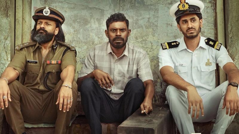 Jayasurya and Vinayakan with a co-star on the official Titans U/A 16+ release poster