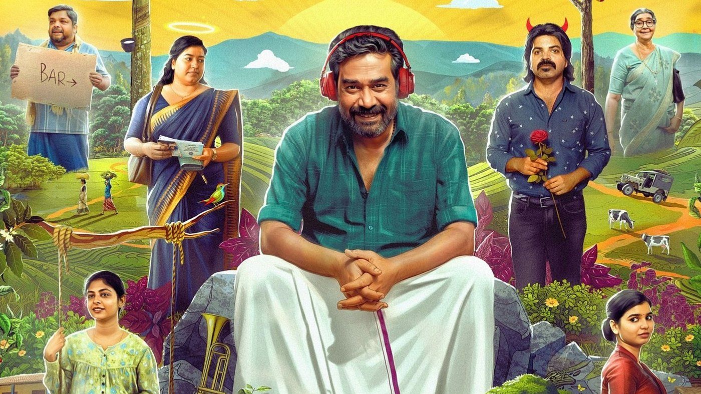 Avaraachan and Sons still with Biju Menon seated among his family in green hills