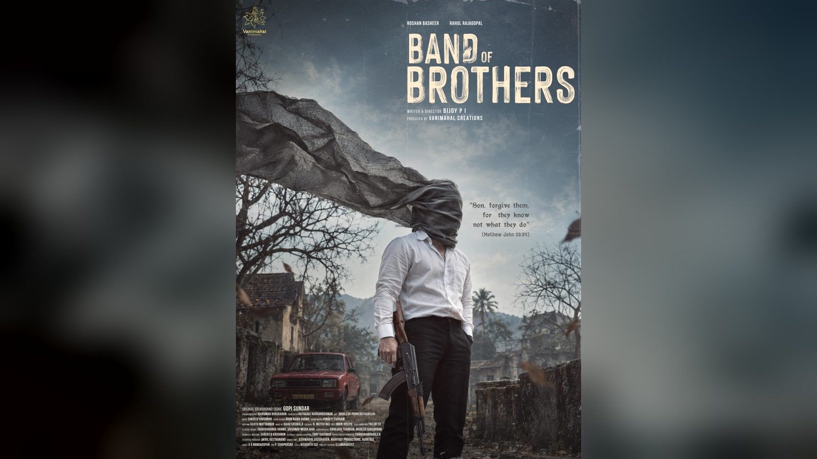 Band of Brothers first-look poster: hooded man in white shirt holding a rifle in a ruined village