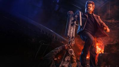 Sardar 2 still with Karthi standing amid fire and wreckage at night