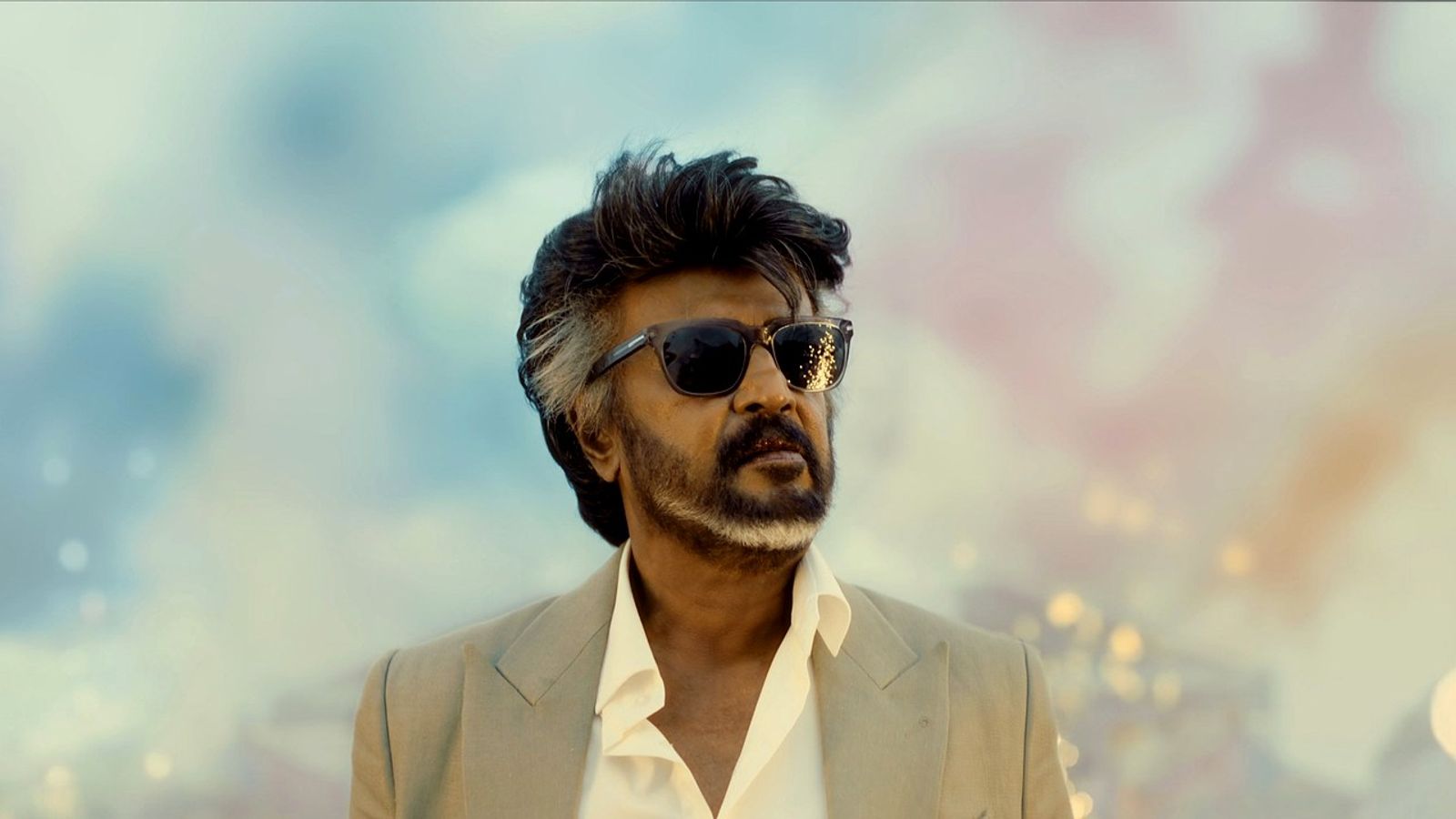 Rajinikanth in sunglasses and a beige suit in a still from Jailer 2