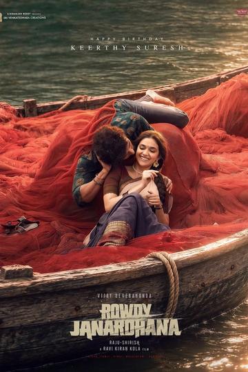 Rowdy Janardhana poster with Vijay Deverakonda and Keerthy Suresh lying in a wooden boat heaped with red fishing nets on a river