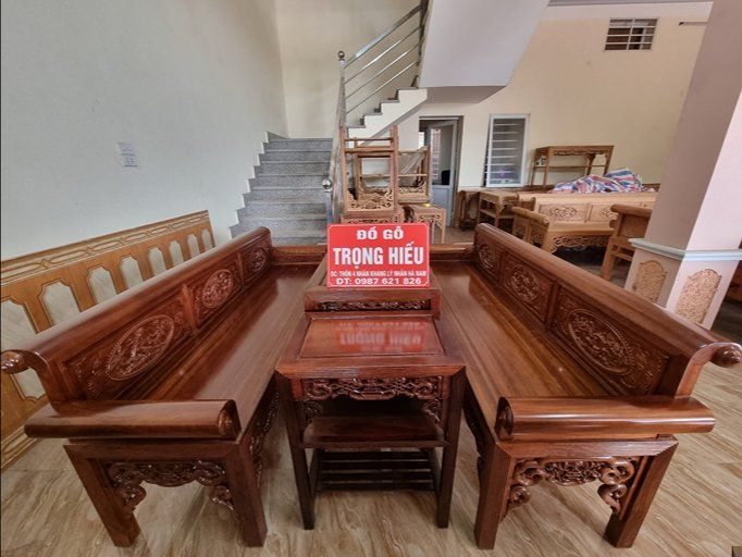 Bộ trường kỷ gỗ gụ Lào đục tay thủ công từ Đồ Gỗ Trọng Hiếu.