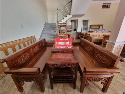 Bộ trường kỷ gỗ gụ Lào đục tay thủ công từ Đồ Gỗ Trọng Hiếu.
