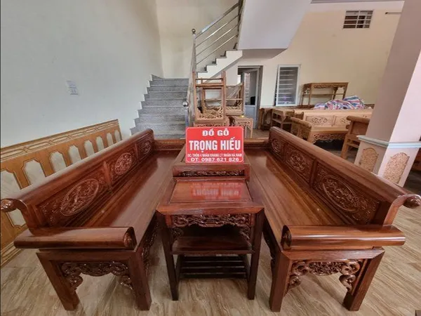 Bộ trường kỷ gỗ gụ Lào đục tay thủ công từ Đồ Gỗ Trọng Hiếu.