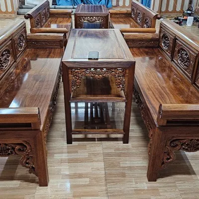 Trường kỷ gỗ gụ ta Quảng Bình đục chạm thủ công yếm phúc rơi, của Đồ Gỗ Trọng Hiếu.